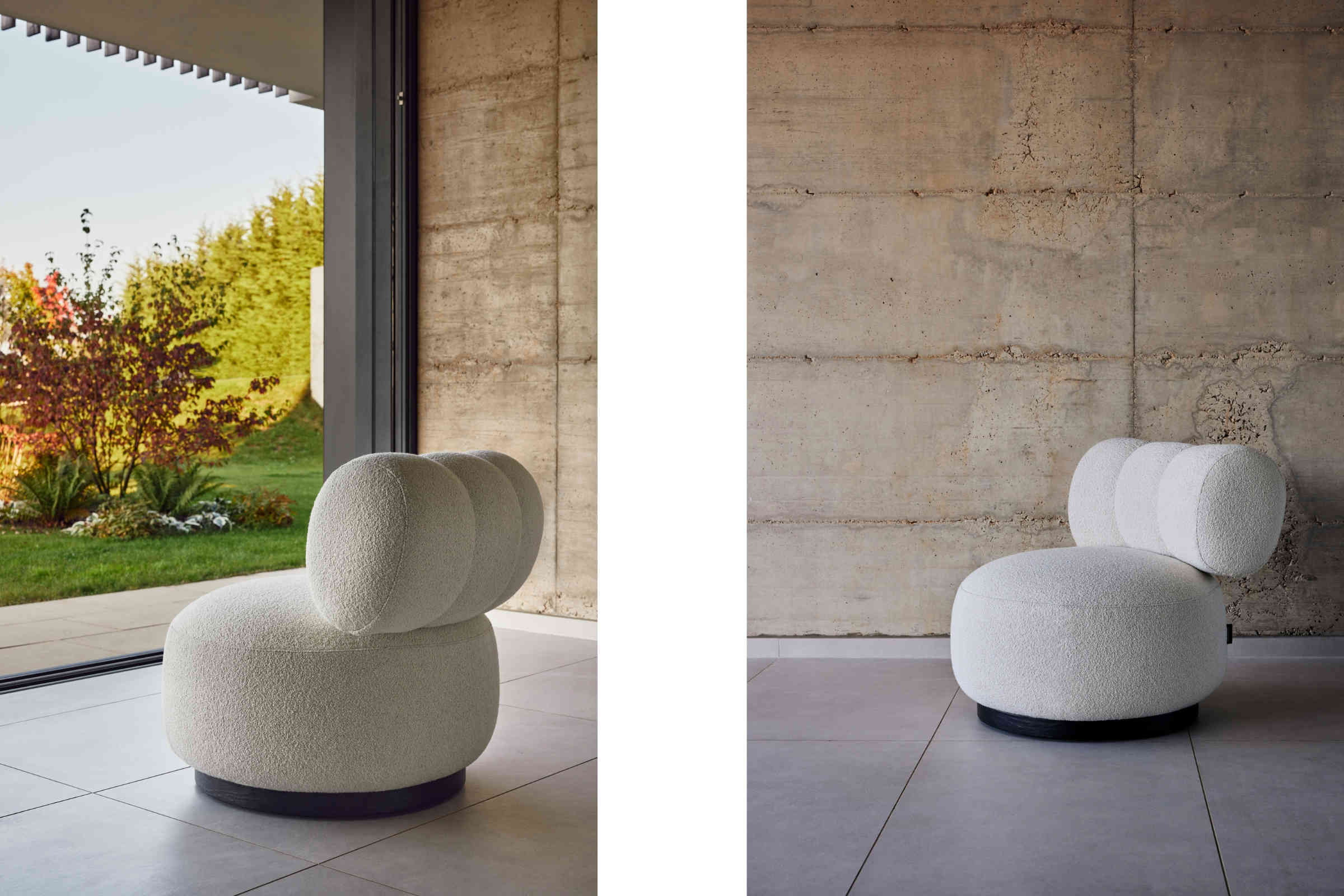 ASPEN Designer Sessel in Beige vor Betonwand und Blick in Gartenlandschaft