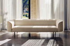 LE MANS Designer Sofa in Creme vor großer Fensterfront