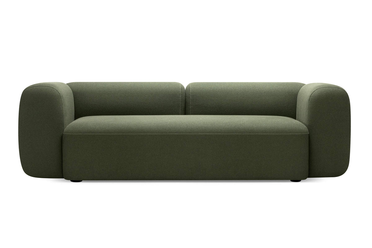 MONOLITE Designer Sofa in Dunkelgrün mit breiten Armlehnen und weicher Sitzfläche