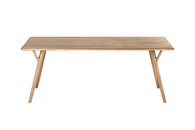 Vorderansicht des ORGANIC Massivholz Esstisches, der minimalistisches Design mit schlanker Tischplatte und schlichten Beinen zeigt