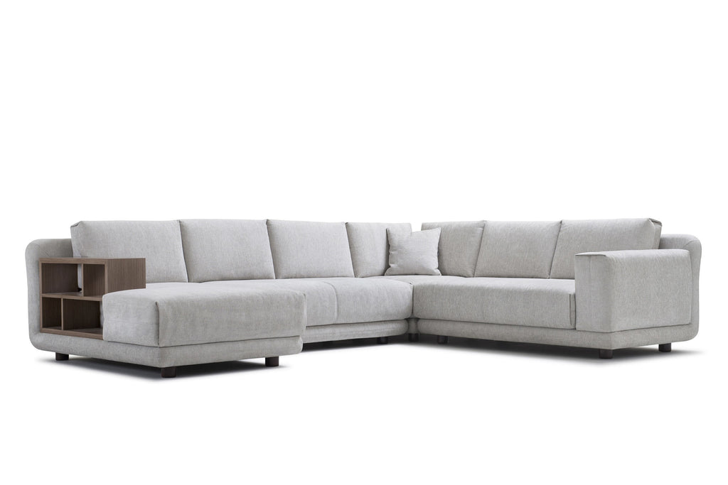 Sofa als modulare Wohnlandschaft mit Holzablage und großzügigen Sitzflächen