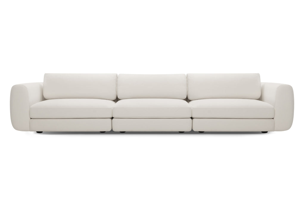 Designer Modular Sofa als Dreisitzer in Cremeweiß mit breiten Sitzkissen und weichen Rückenpolstern