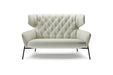 VIGO Designer Sofa in hellem Leder mit schwarzem Metallgestell, elegante Frontansicht