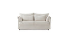 Sofa mit gerollten Kissen an den Armlehnen – Design im Landhausstil